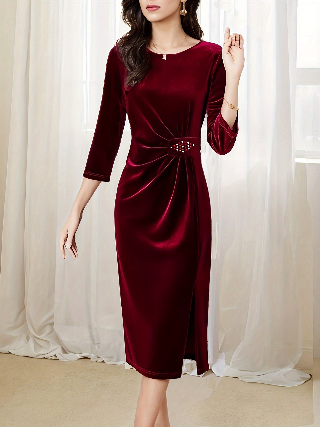 Elegant burgundy velvet midi dress with a belt detail and three-quarter sleeves for a chic look