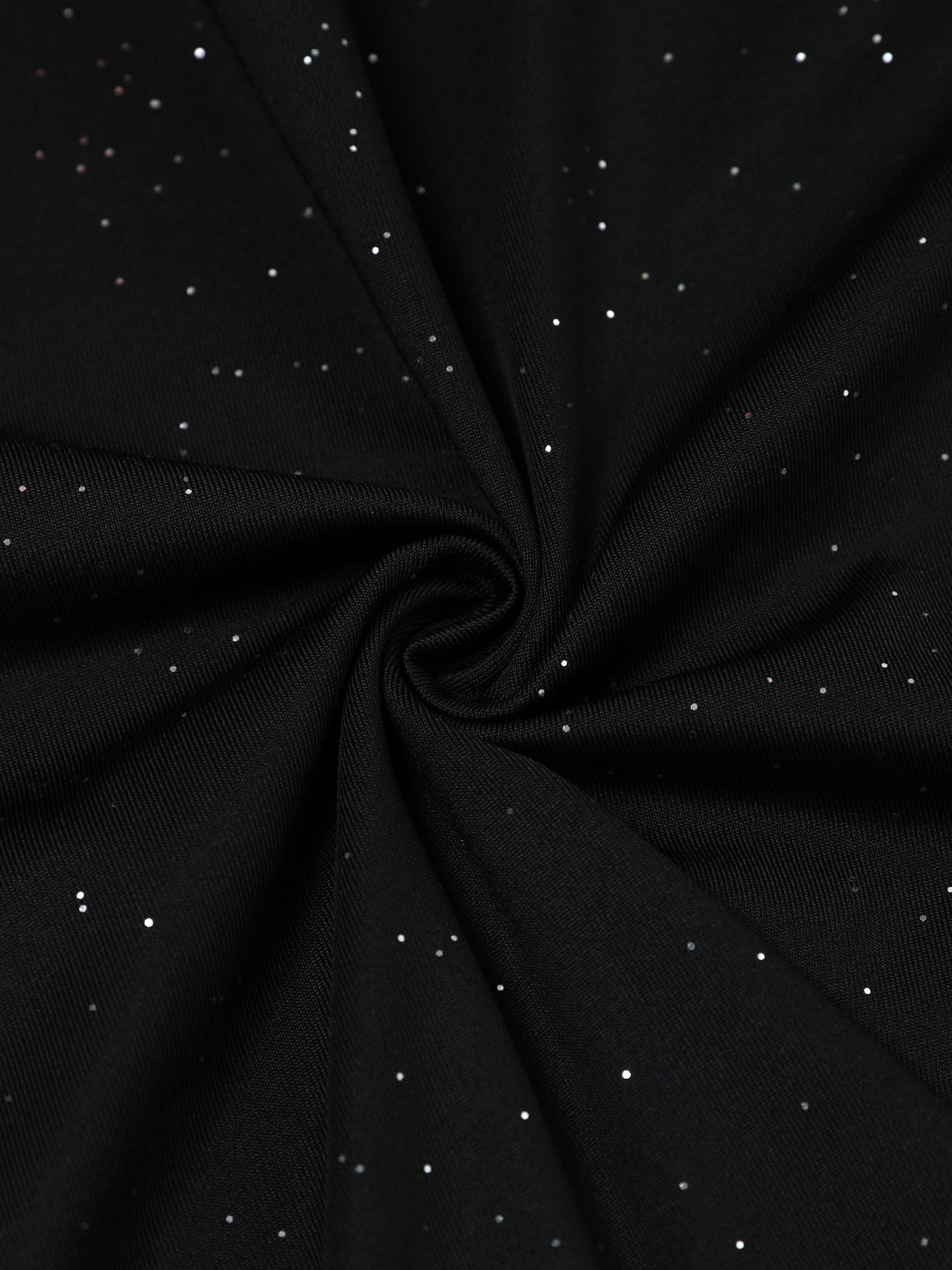 Close-up of soft fabric with sparkling sequins, ideal for a red sequined bodycon dress