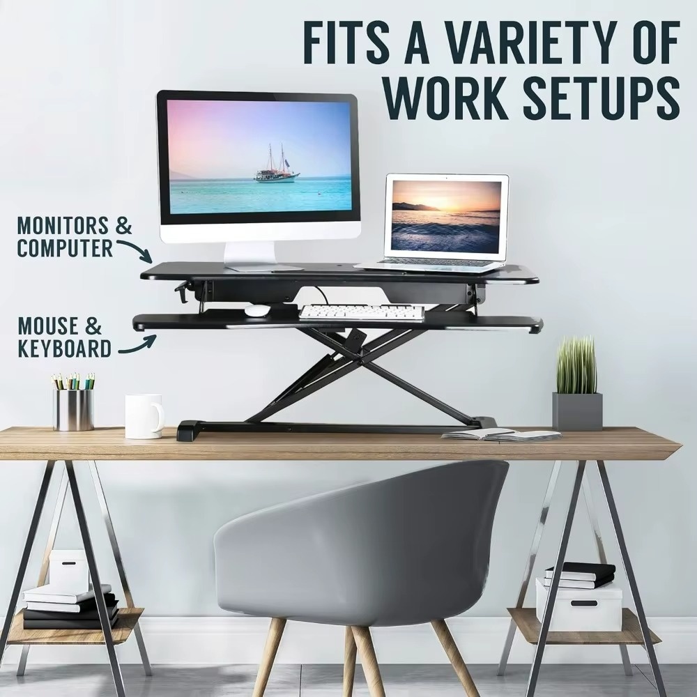 Magazaw height adjustable desk converter designed to fit various work setups with dual monitors and keyboard