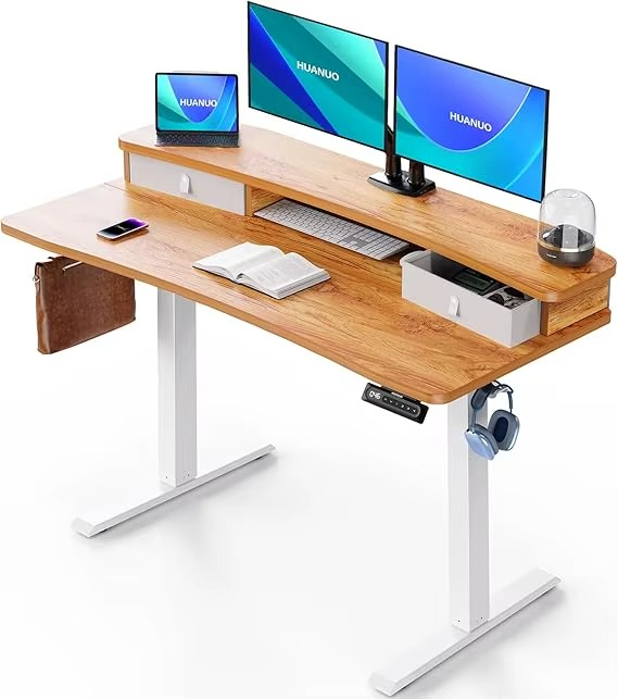 Magazaw adjustable standing desk with drawers featuring a spacious wooden surface and dual monitors