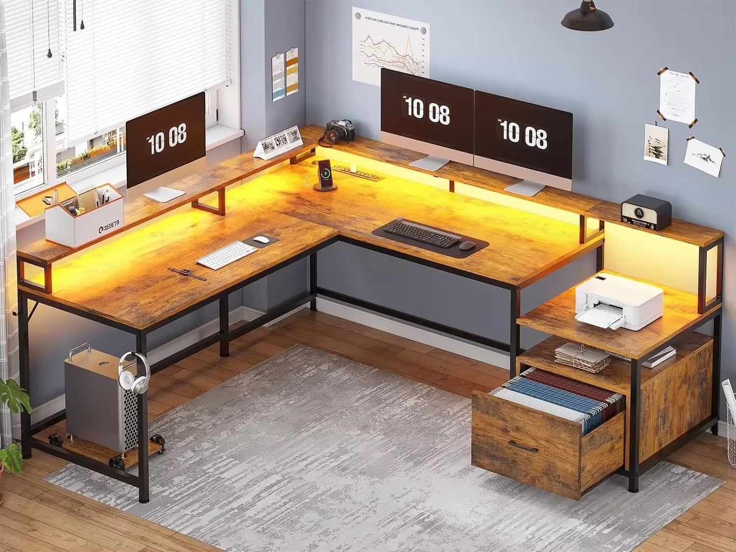 Spacious Magazaw L-shaped office desk with LED lights and dual monitor setup for efficient workspaces