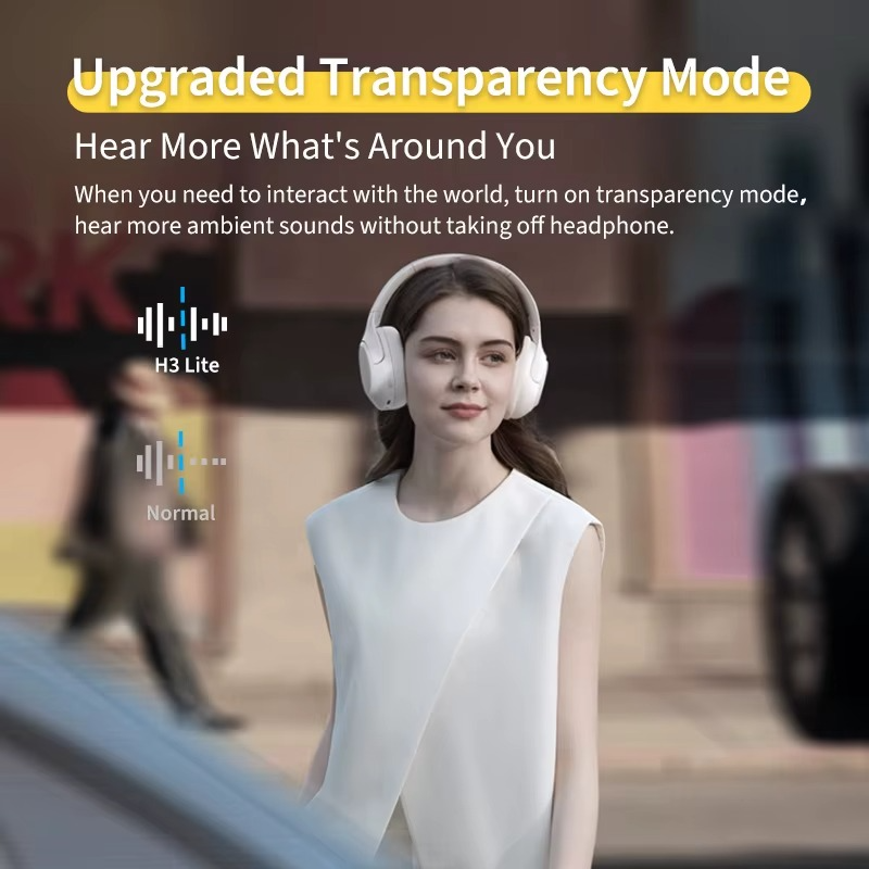 Woman wearing QCY H3 Lite Bluetooth headphones with upgraded transparency mode for ambient sound awareness