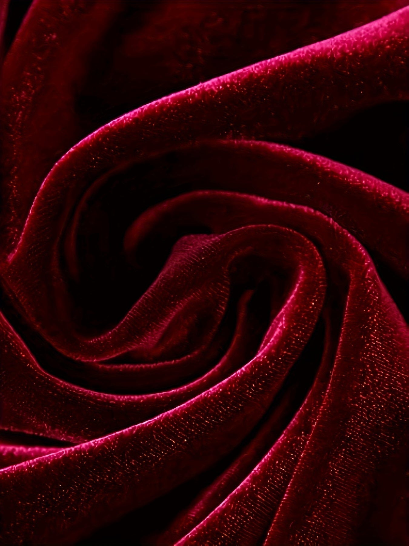 Luxurious red velvet midi dress fabric showing a rich, soft texture ideal for elegant occasions