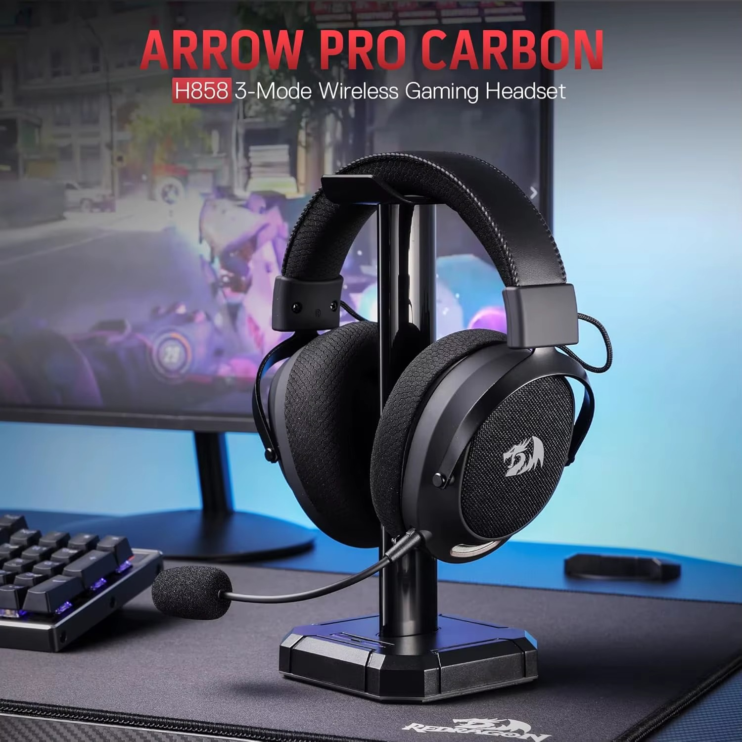 Redragon H858 wireless headset displayed on a stand with a gaming setup in the background