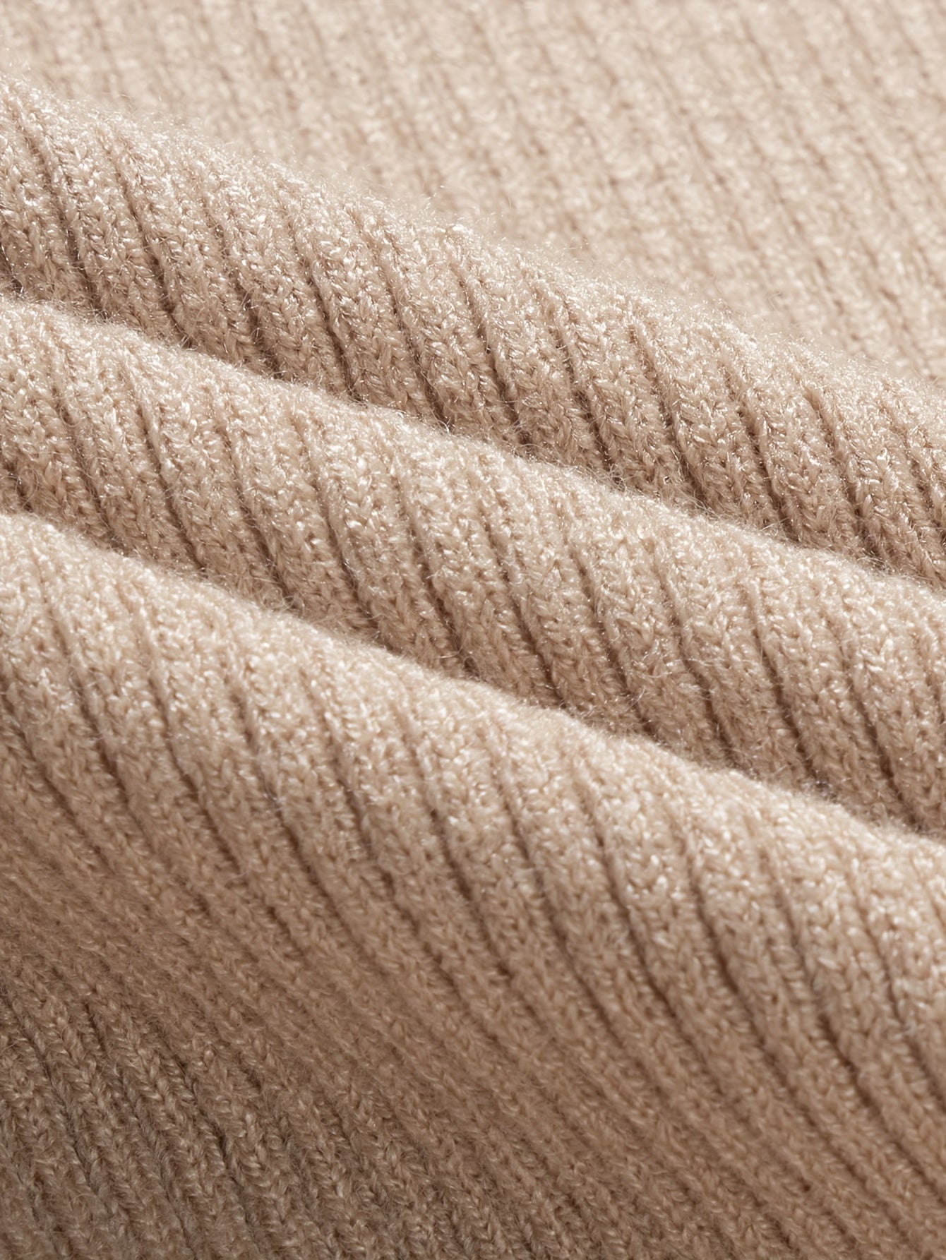 Close-up of Voocci™ slim fit turtleneck tee in soft ribbed fabric, showcasing texture and warmth