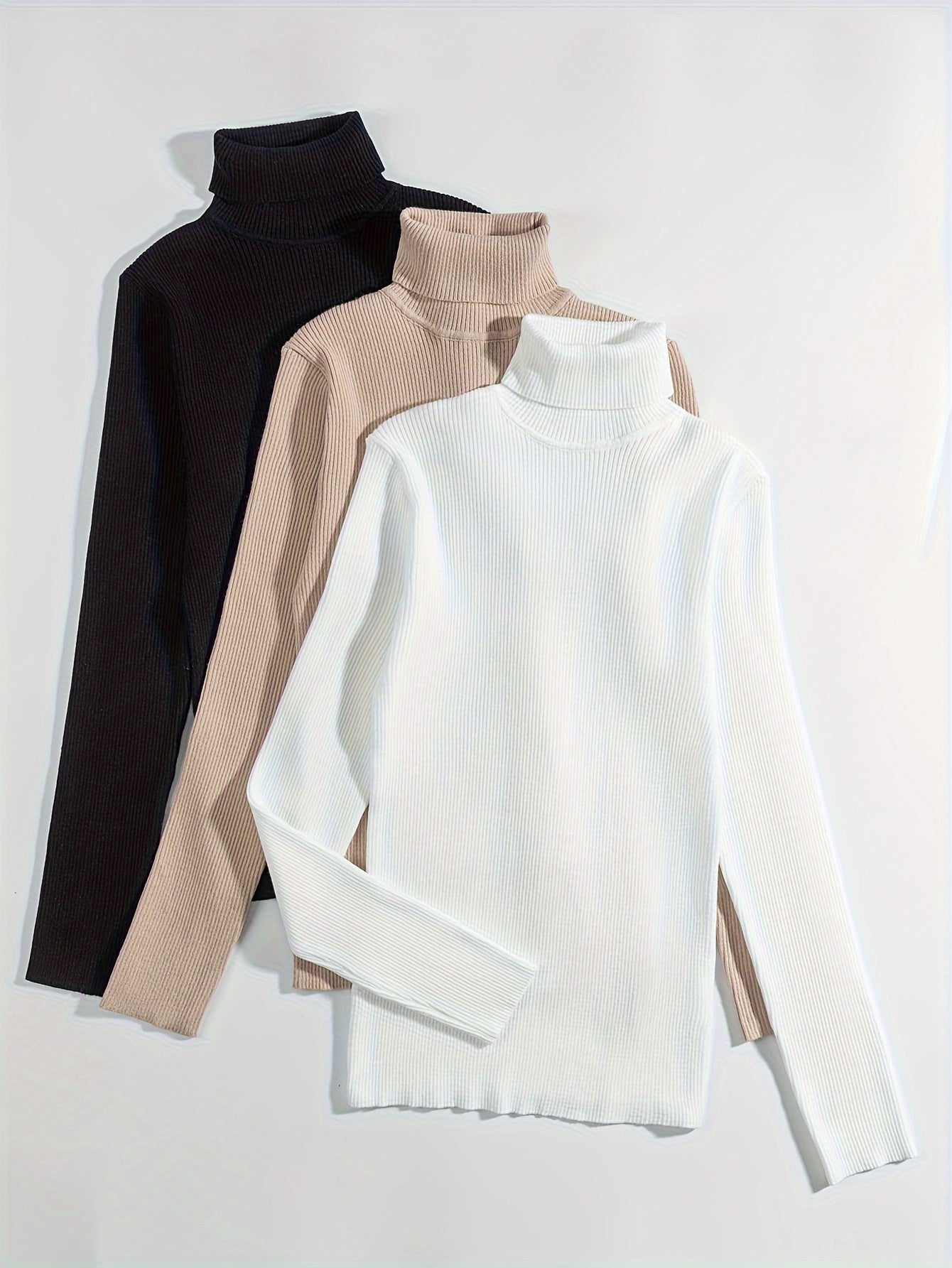 Voocci™ slim fit turtleneck tee available in black, beige, and white colors for stylish layering