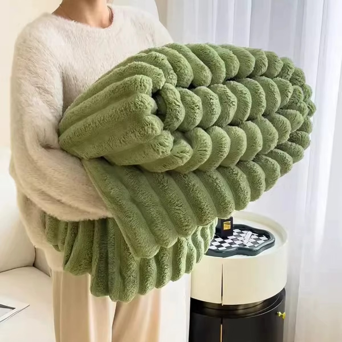 Magazaw soft plush velvet blanket in green, stylishly folded for cozy warmth and comfort