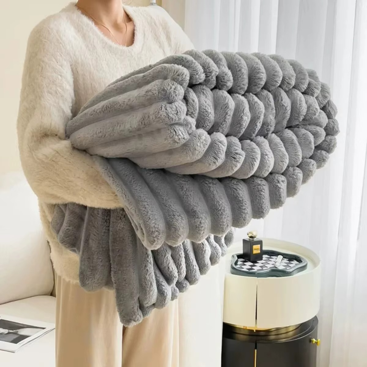 Magazaw soft plush velvet blanket in light gray, perfect for cozying up on chilly evenings