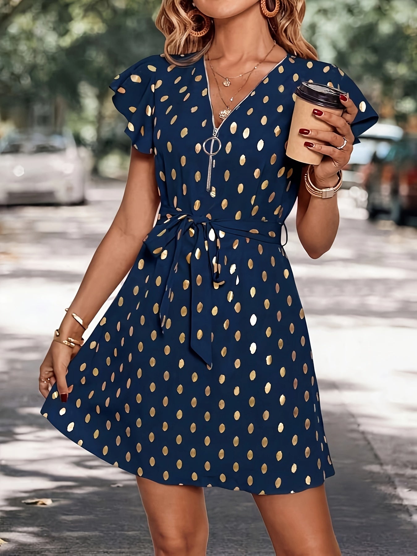 Voocci spring summer women's dress featuring a navy base with golden polka dots and a stylish belt.