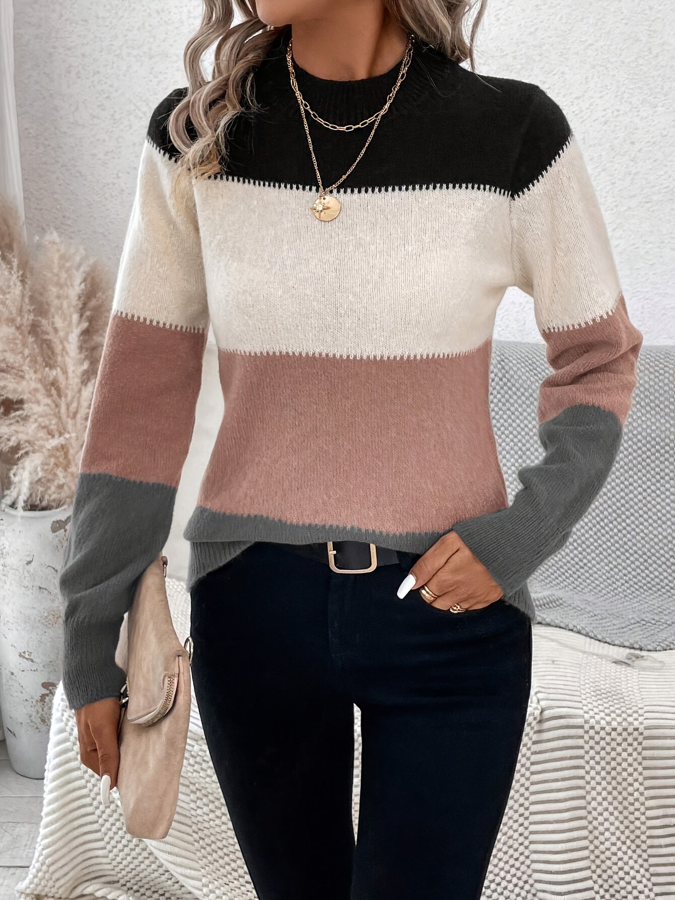 Voocci women's knitted pullover sweater in color block design with long sleeves and a round neckline