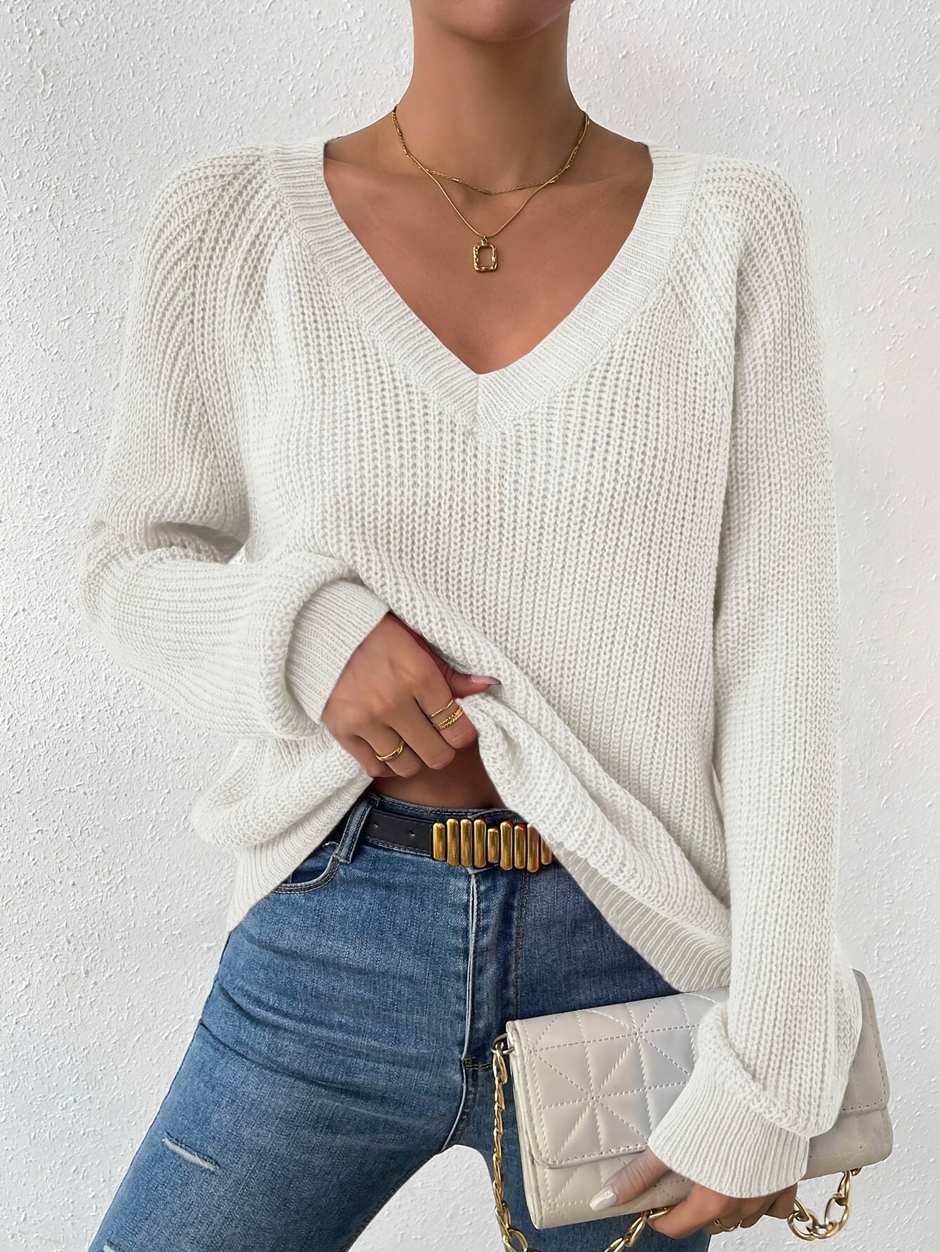 Voocci women's raglan sleeve sweater in white, featuring a V-neck design and oversized fit