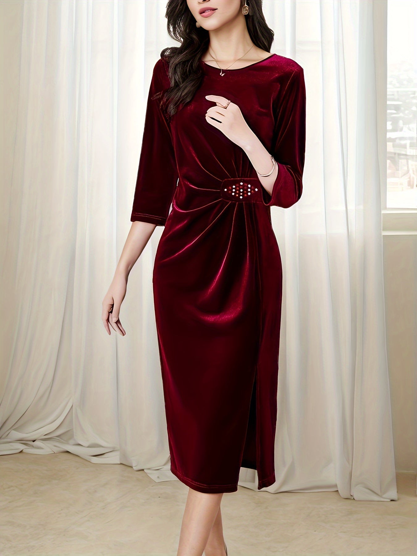 Elegant burgundy velvet midi dress with a belted waist and side slit for a stylish look