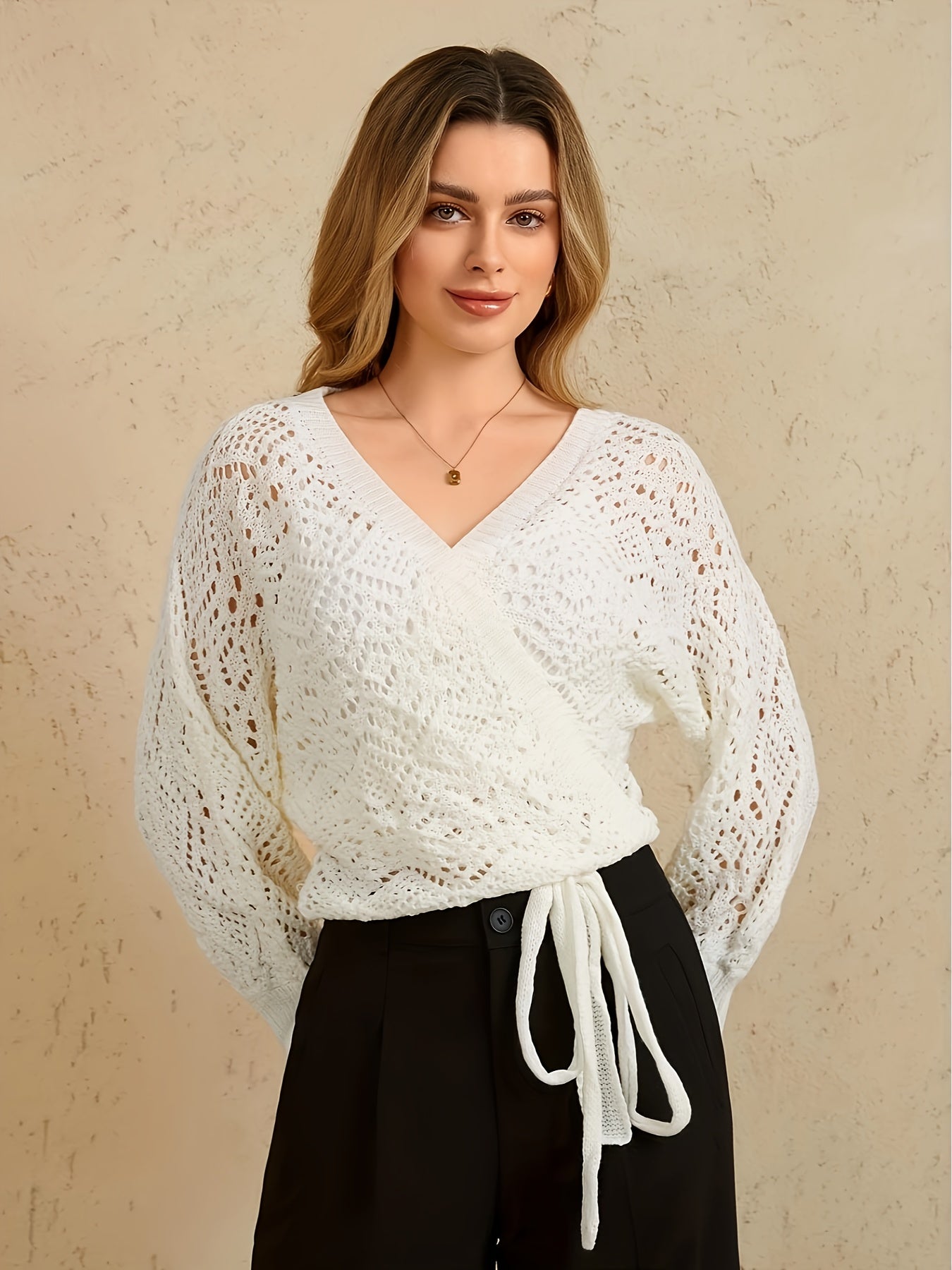 Voocci™ elegant v-neck knit cardigan in white with a stylish wrap design and open knit texture