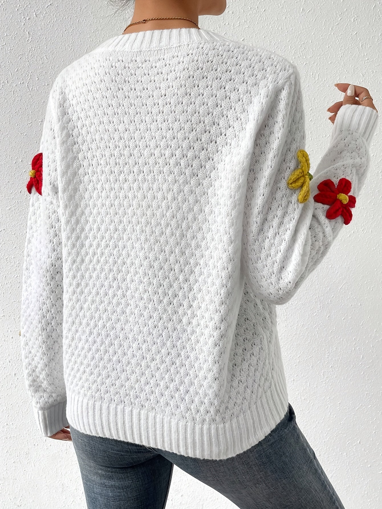 Voocci floral design knitted sweater in white with colorful flower accents on sleeves