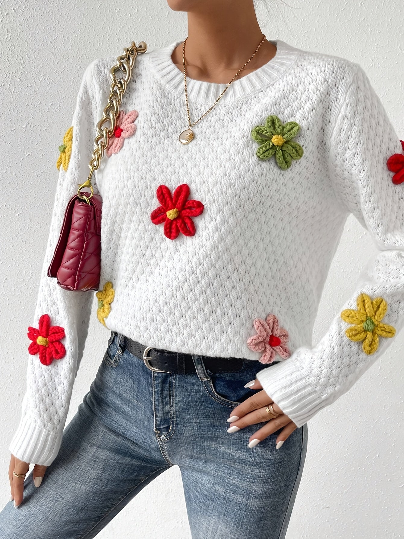 Voocci floral design knitted sweater in white with colorful flower accents for a stylish look