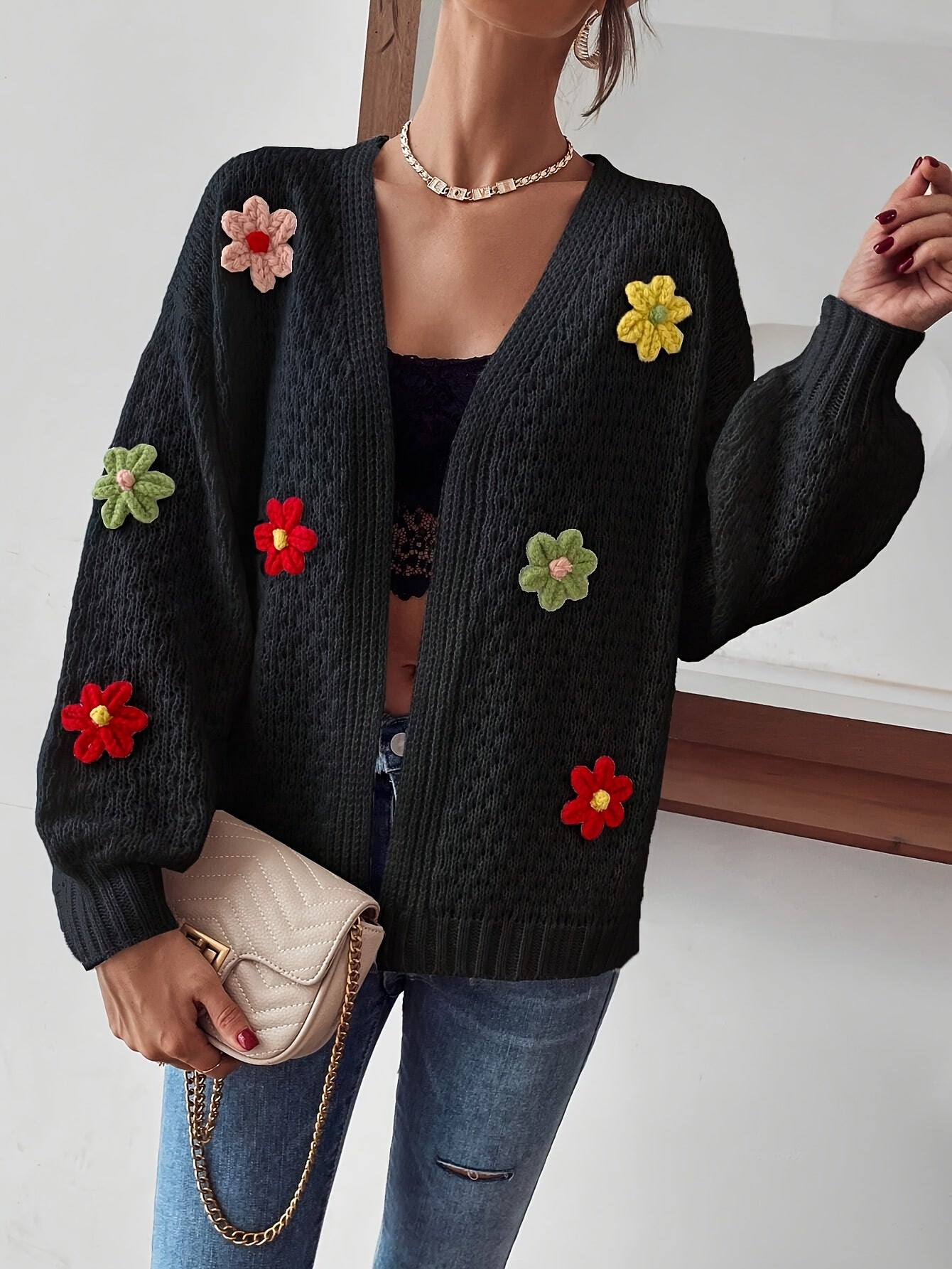 Voocci™ floral pattern women's cardigan with colorful flower appliques on a black background