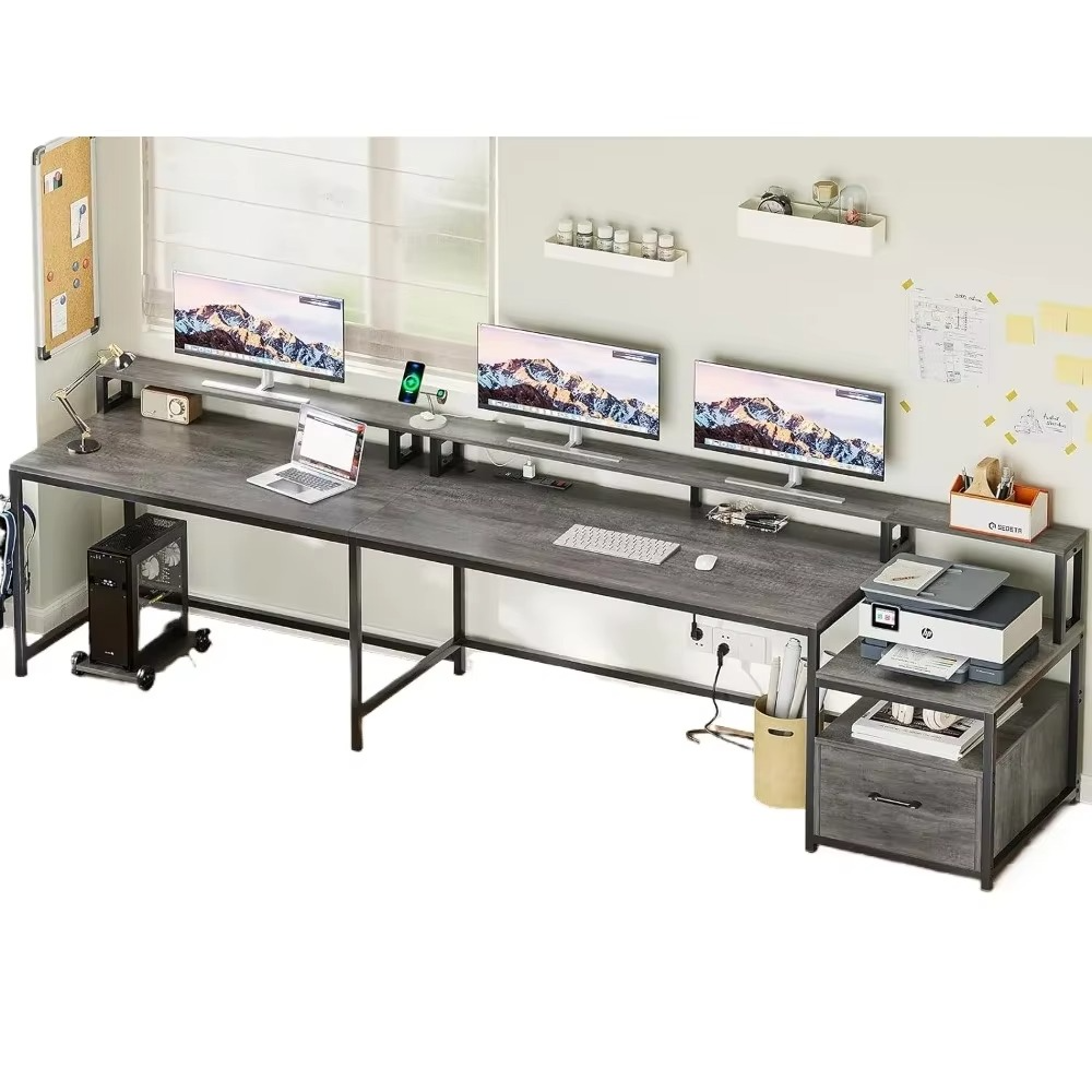 Magazaw L-shaped office desk with LED lights featuring a modern gray design and multiple monitors