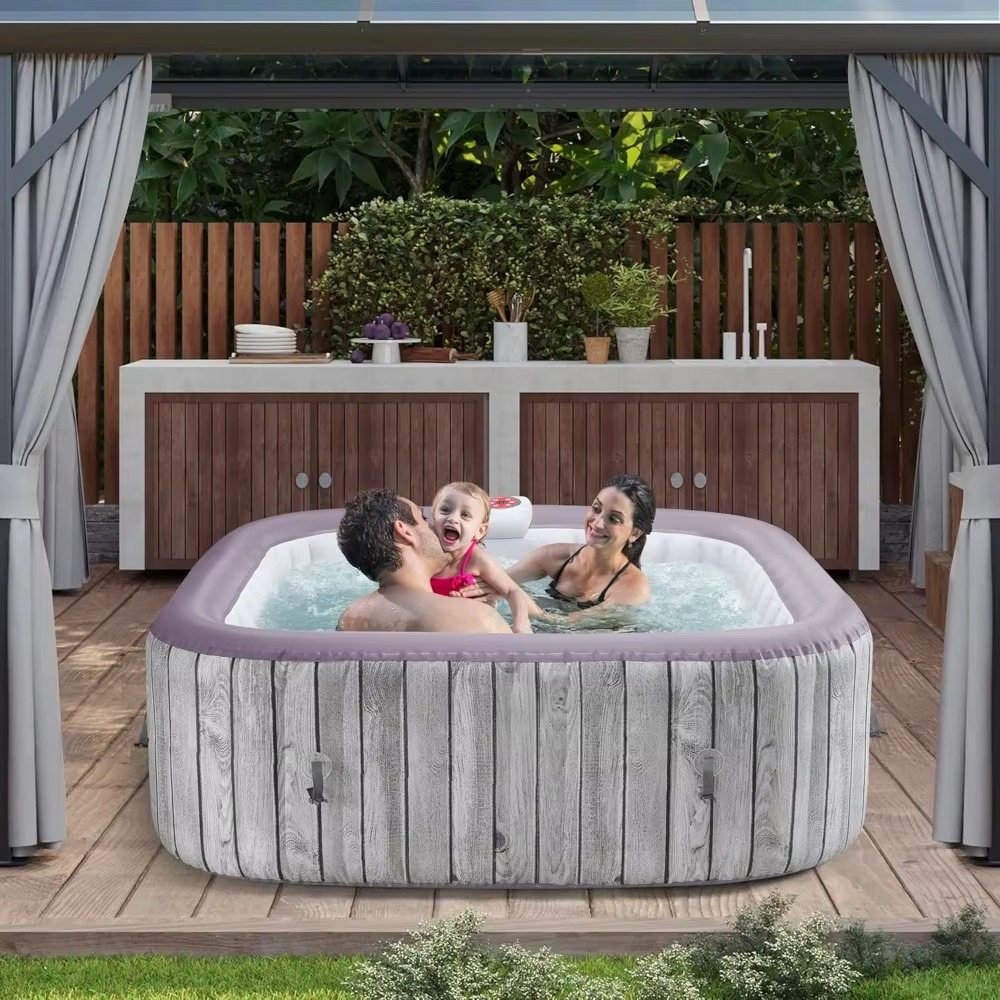 Magazaw portable inflatable hot tub with family enjoying a relaxing soak in a backyard setting