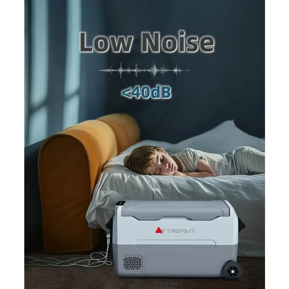 Magazaw portable car refrigerator 12V beside a sleeping child, featuring low noise operation under 40dB