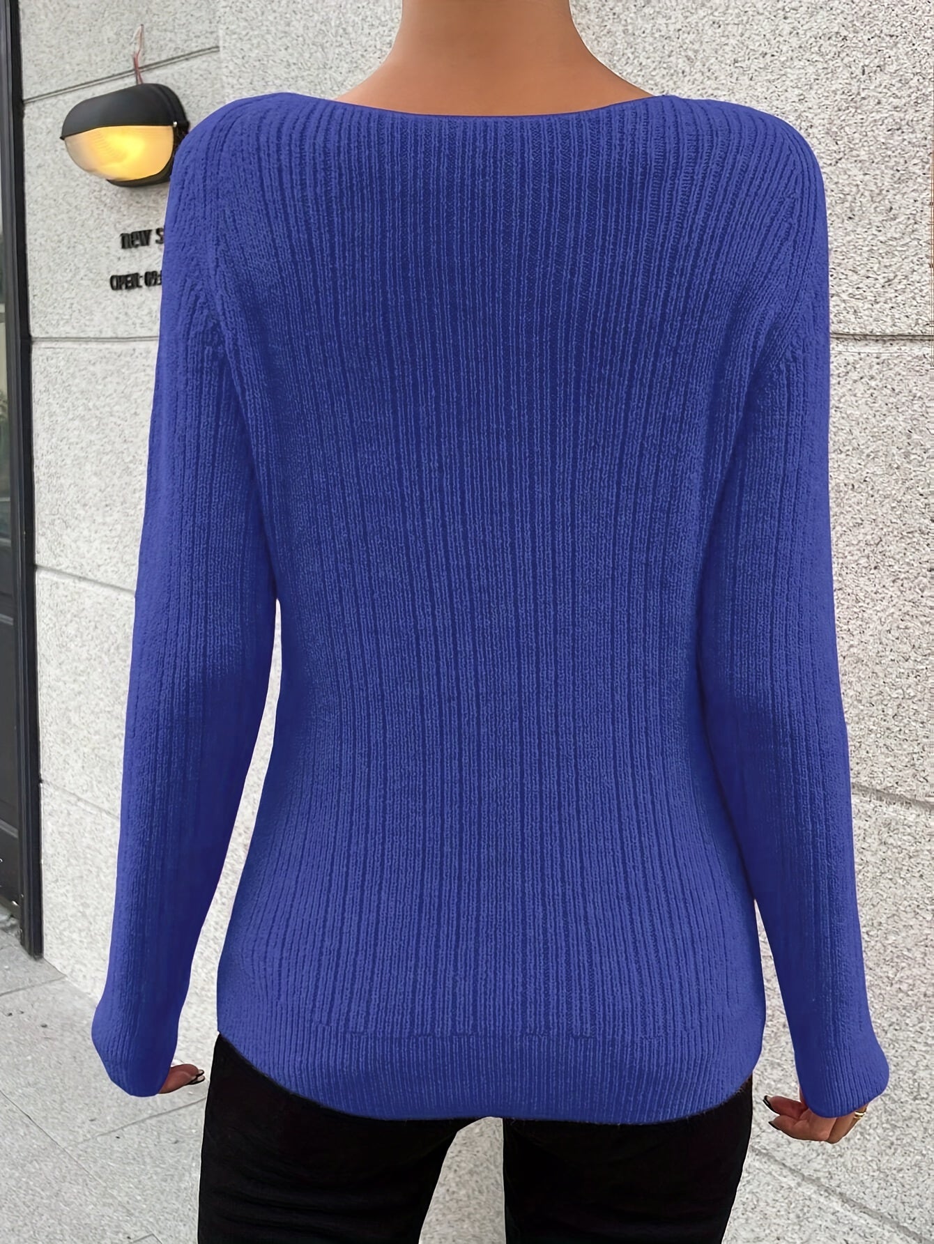 Voocci women's knitted sweater in vibrant blue with a ribbed texture and relaxed fit