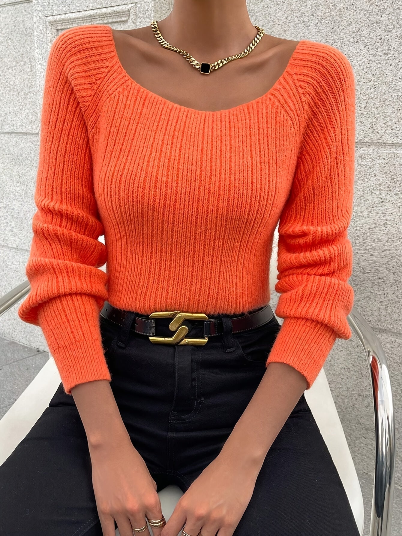 Voocci women's knitted sweater in vibrant orange with ribbed detailing and stylish sleeves