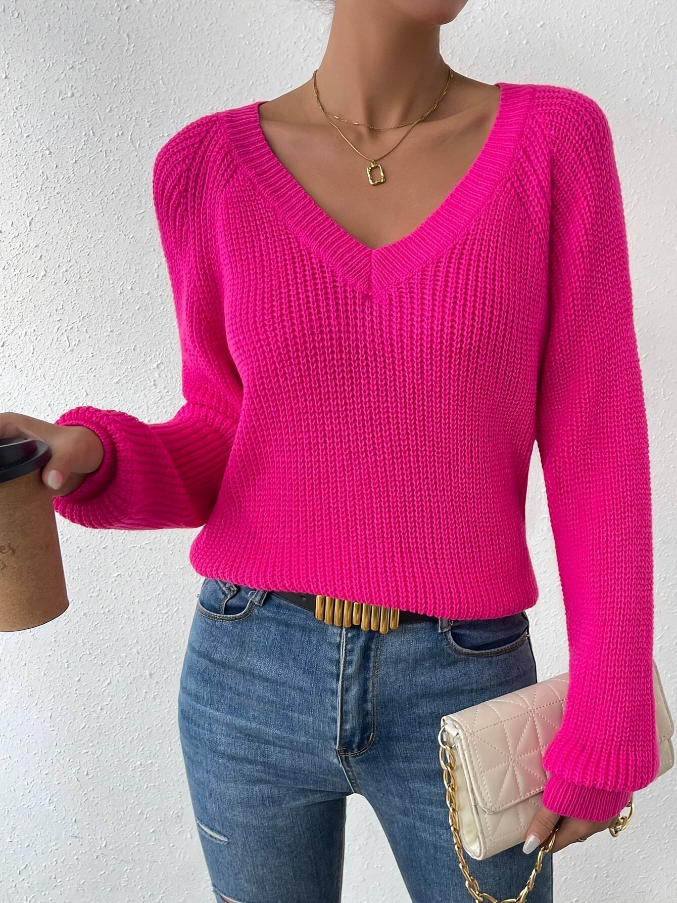 Voocci women's raglan sleeve sweater in bright pink, featuring a V-neck and ribbed knit texture
