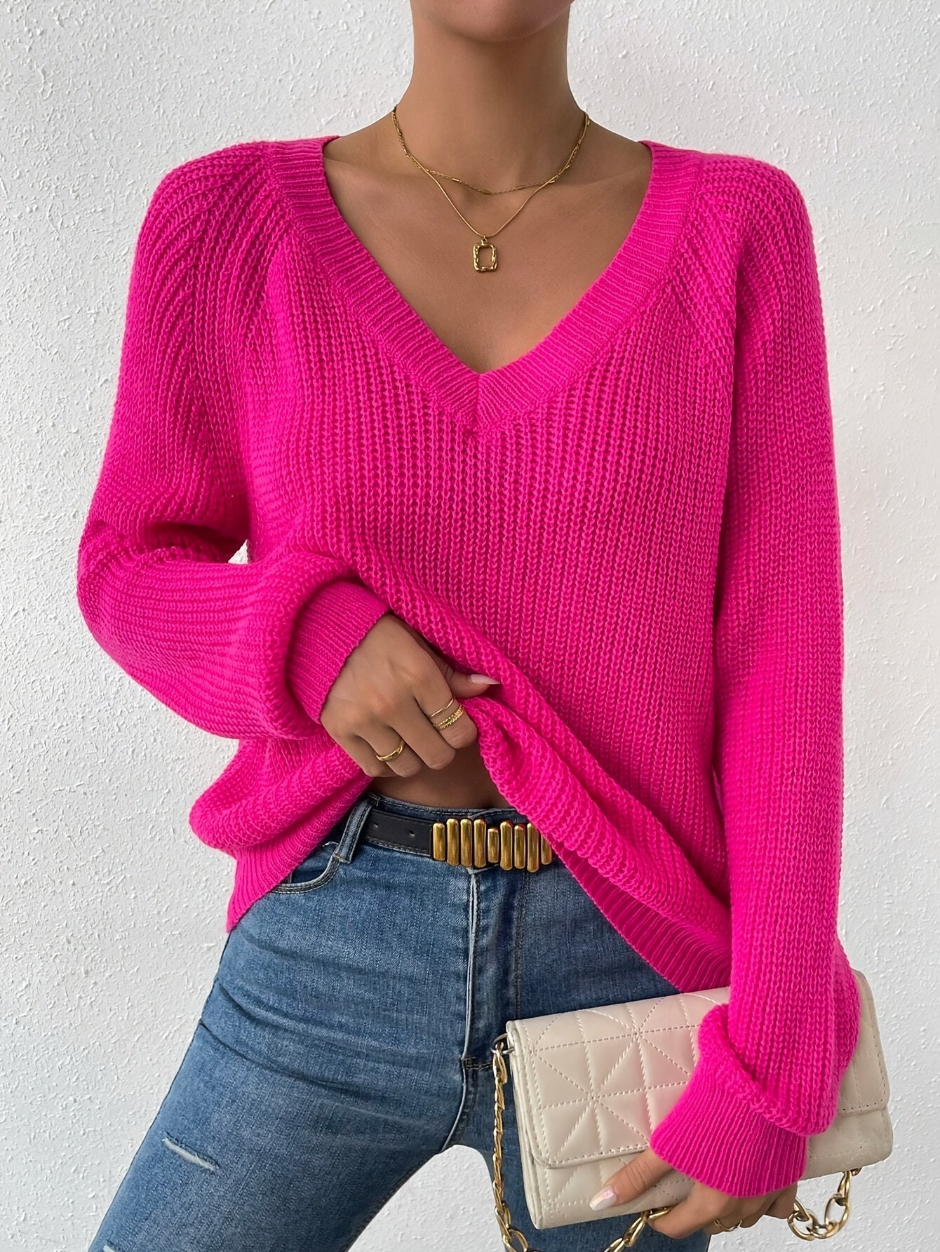 Voocci women's raglan sleeve sweater in vibrant pink with a V-neck design and cozy fit